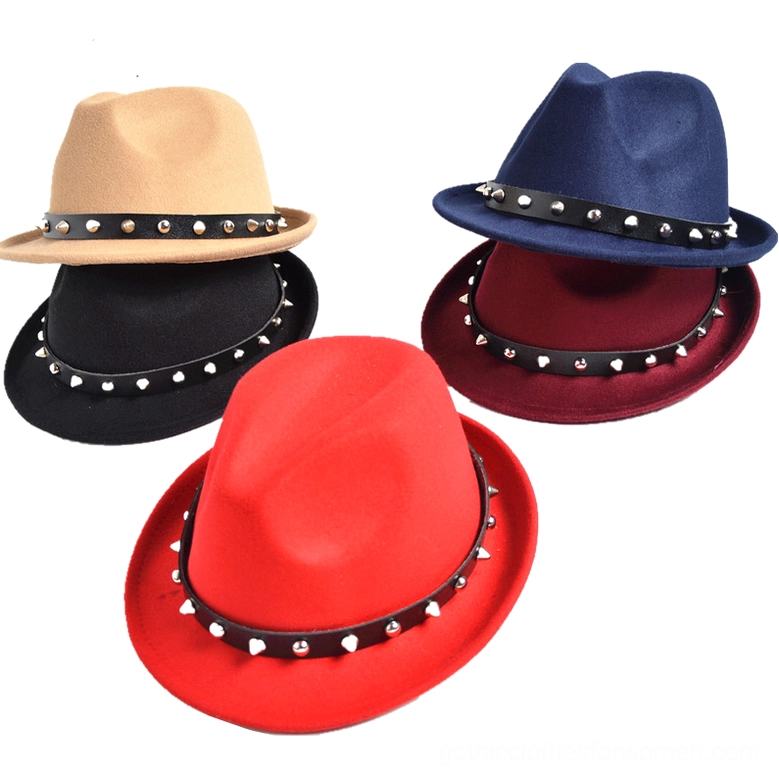 Multiple gothic spike studded fedora hats in assorted colors displayed together showing identical studded leather band design