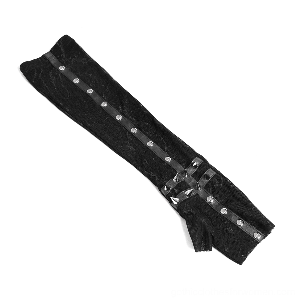 Flat lay close-up of gothic fingerless arm sleeve featuring cross rivet decorative pattern and studded strap detail
