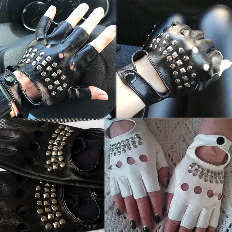 Black and white studded punk fingerless gloves close-up car interior scene