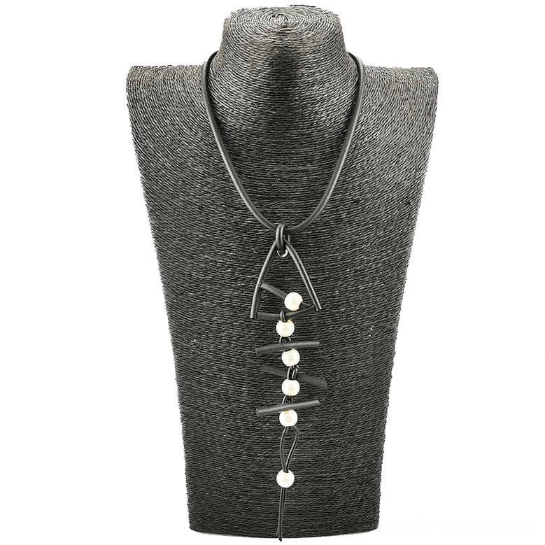 Fish bone rubber pendant necklace displayed on fabric dress form, featuring matte black cord with pearl embellishments in gothic aesthetic