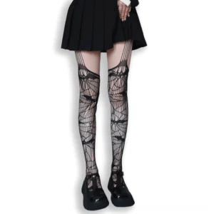 Black gothic mesh tights with bat and spiderweb motifs paired with pleated mini skirt, centered front angle