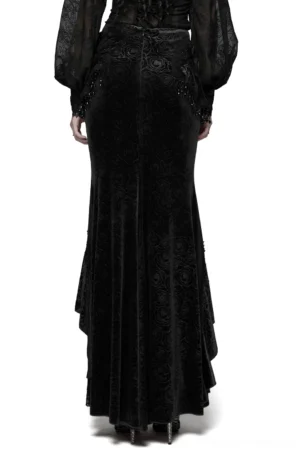 Gothic black velvet fishtail skirt worn with sheer mesh blouse, full rear view displaying layered lace hem and beaded side chains