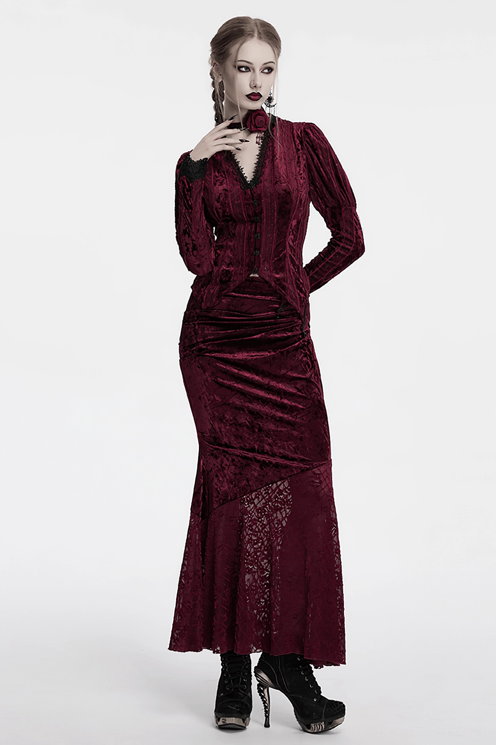 Side angle of wine red gothic fishtail skirt showing ruched panel structure and how crushed velvet meets lace transition