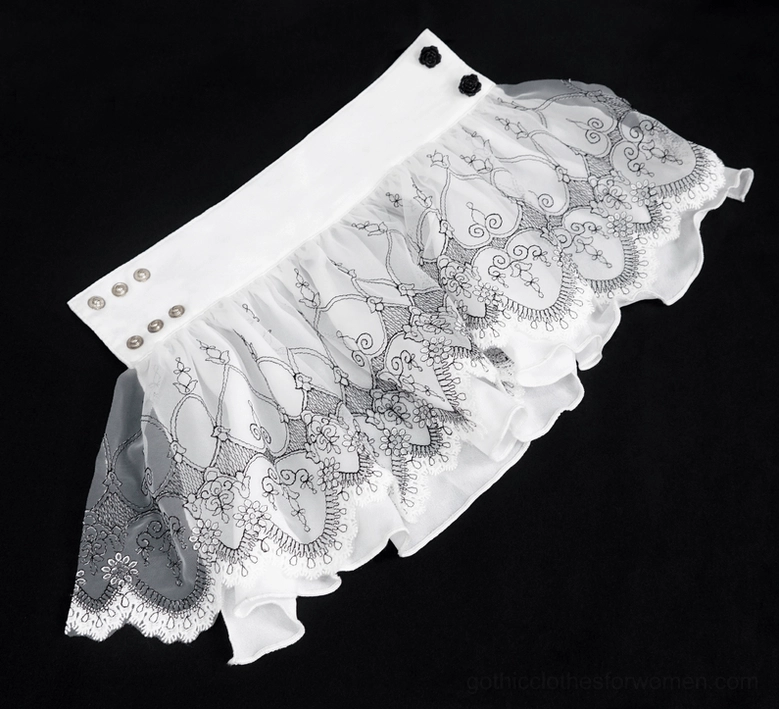 Gothic flared lace glove flat lay on black background, showing ruffled hem and silver snap button closure details