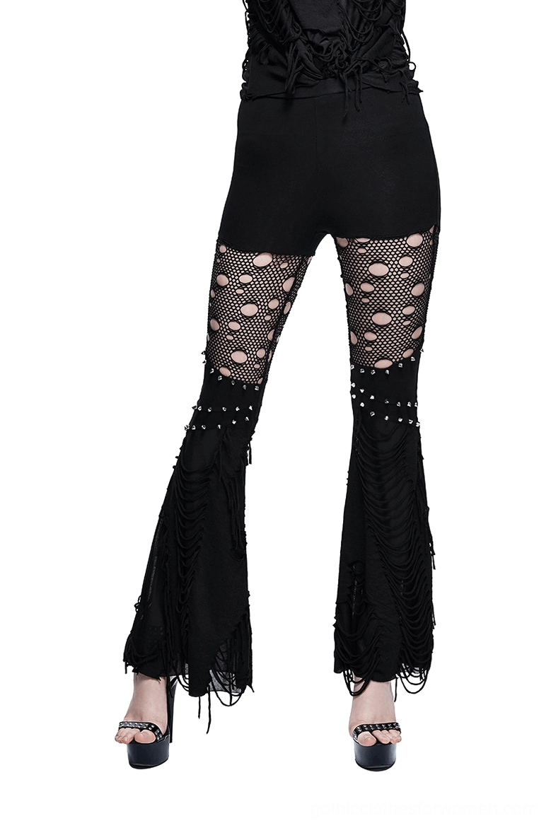 Black flared gothic pants with mesh cutouts and metal studs - front view on model