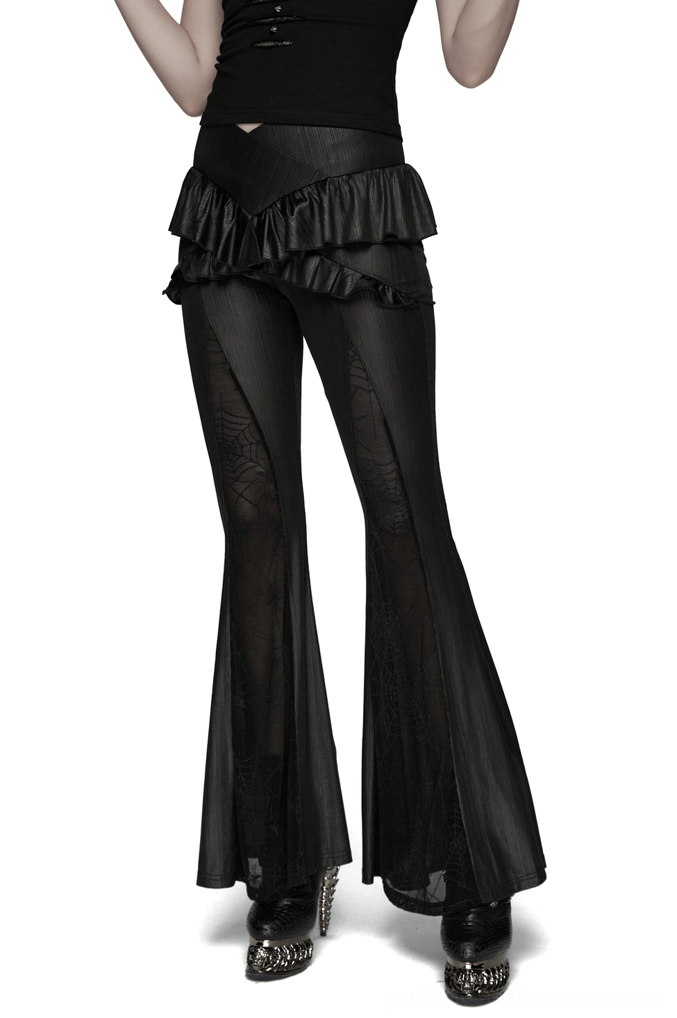 Gothic mesh flared pants worn by model, side front angle displaying cross ruffle waist and sheer spider web mesh inserts against striped knit base