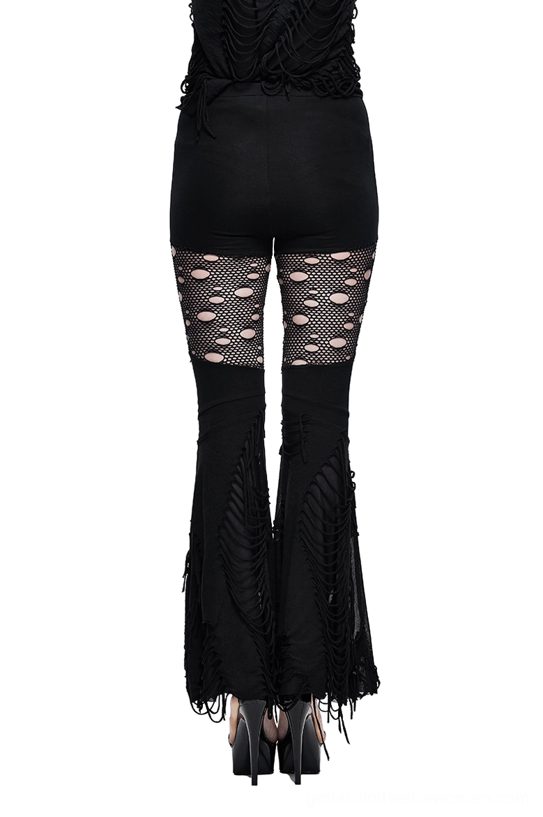 Black gothic flared trousers with studded fishnet panels - back view on model