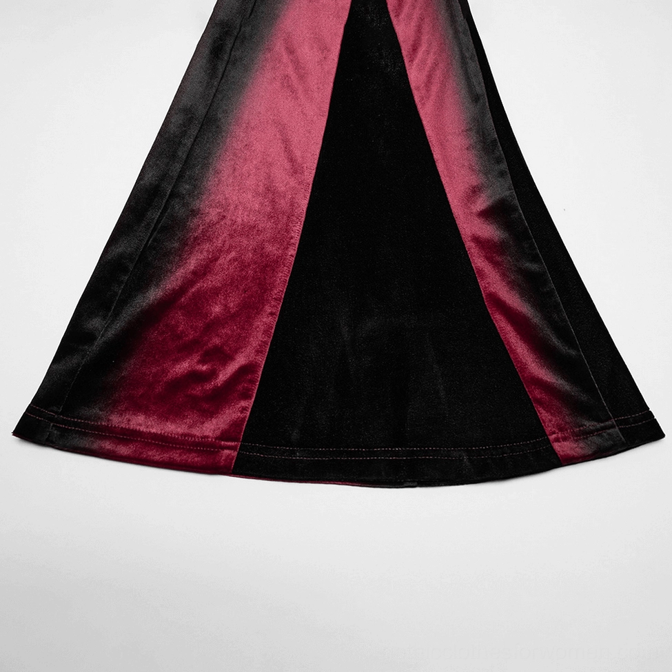 Close-up of two-tone velvet split flared hem detail on wine red gothic pants