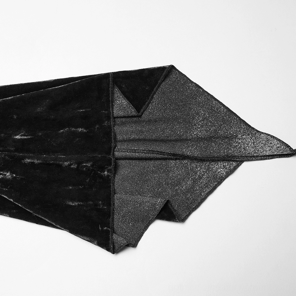 Close-up flat lay of flared sleeve showing double-layer fabric construction with crushed velvet exterior and handkerchief cut edge detail