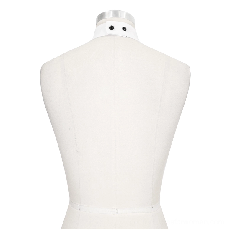 Rear closure of gothic jabot showing white strap with two black button fasteners and back attachment system