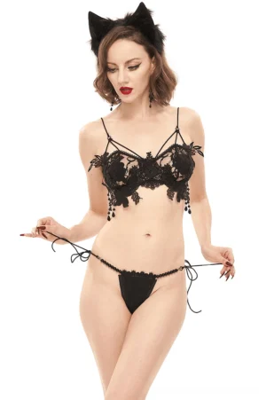 Black floral lace gothic lingerie set front view on model with cat ear headband, featuring beaded cross straps and tie-side thong design