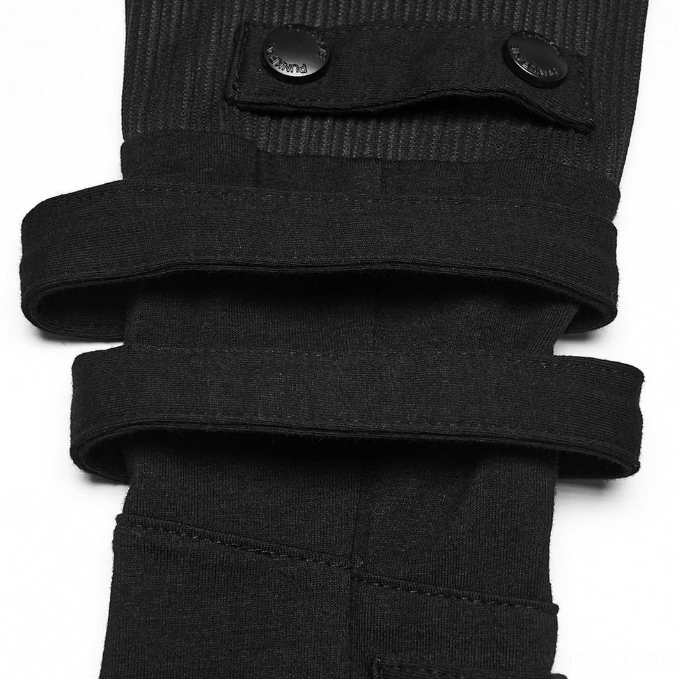 Macro close-up of gothic glove strap assembly showing matte rivet buttons and layered strap band construction