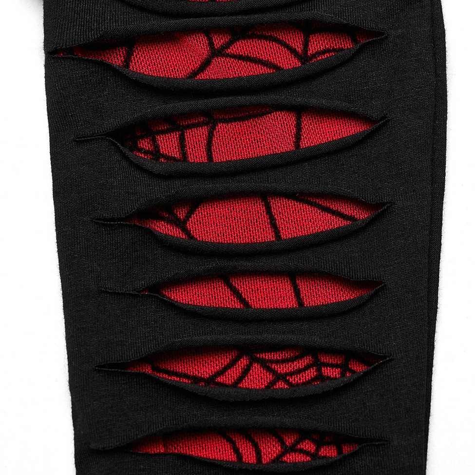 Detailed view of horizontal ripped slits and red spiderweb printed lining inside black gothic fingerless gloves, showcasing the precision cutout design and spider mesh panel work
