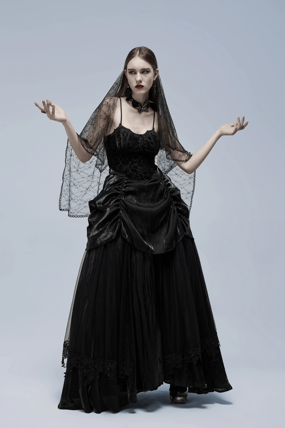 Alternative angle of gothic velvet gown showing bat motif and overall silhouette
