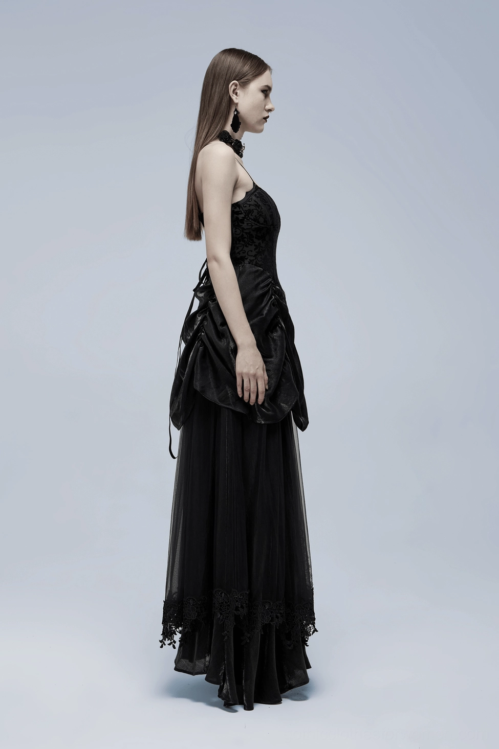 Back angle of gothic gown on model showing drawstring back fit and elegance