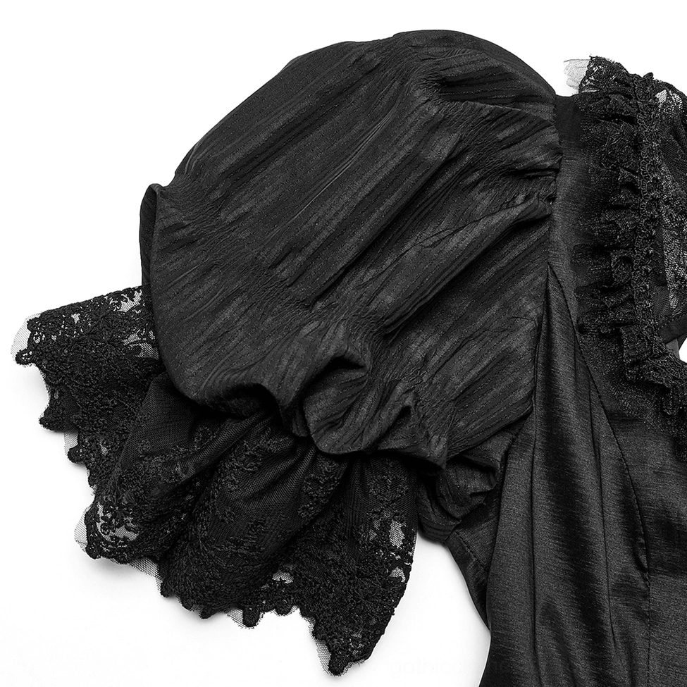 Close-up macro detail of black gothic gown ruched puff sleeve with lace ruffle trim and elastic construction