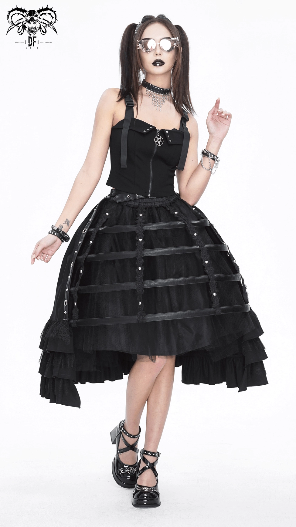 Gothic half skirt flatlay or angled view showing overall silhouette, buckle belt placement, and dramatic ruffle hem design