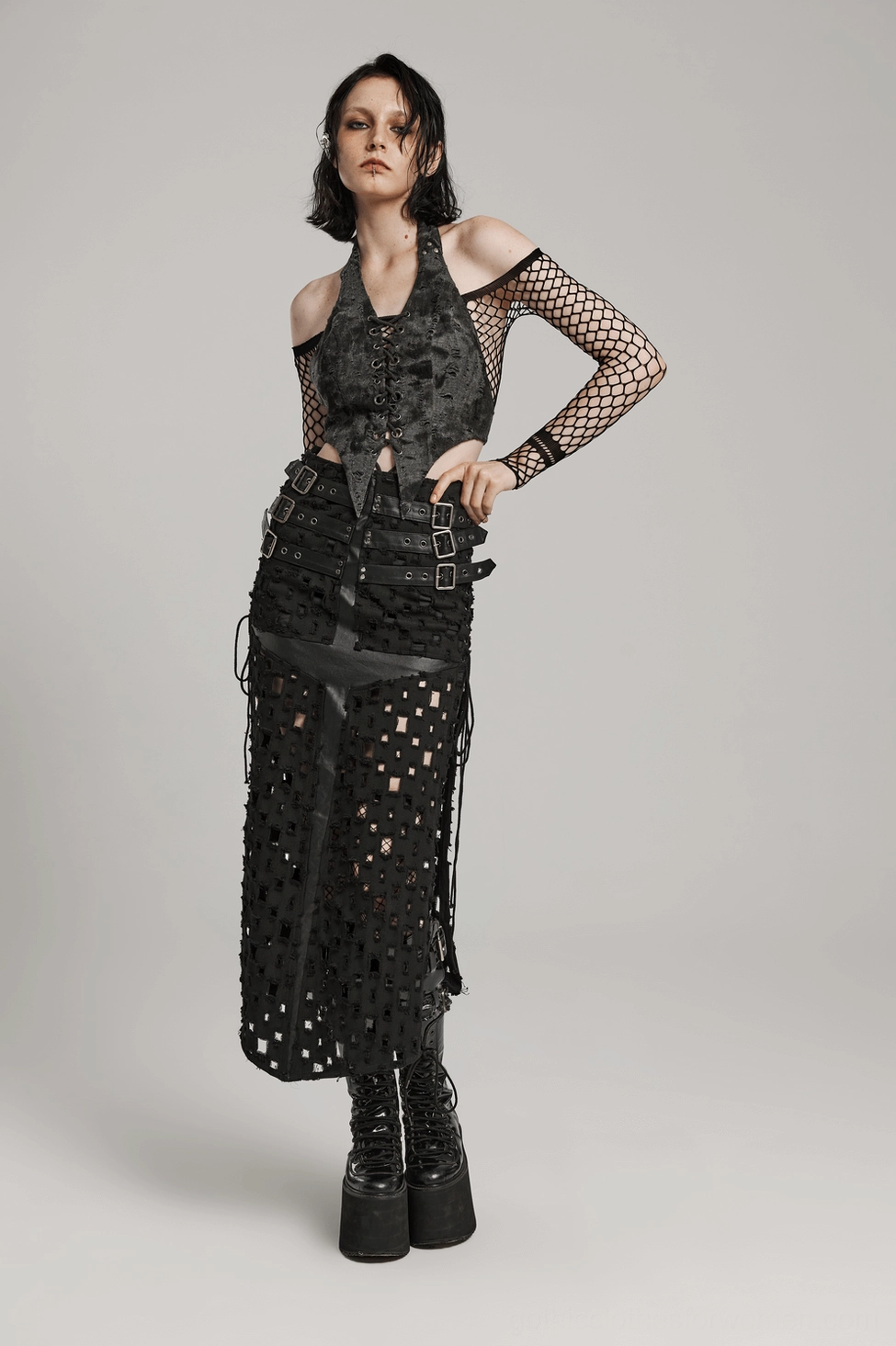 Dark gray gothic halter backless crop top full view on model showcasing complete lace-up front design and open back silhouette