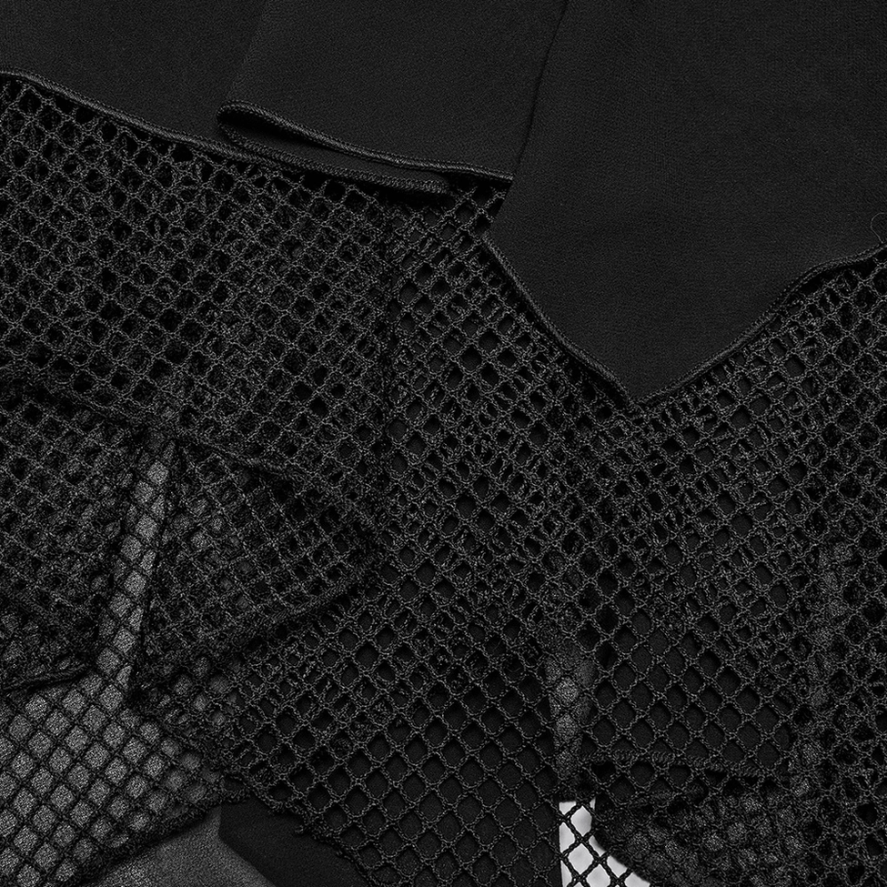 Gothic halter neck dress detail showcasing mesh panels, structured leather corset construction, and lace-up elements