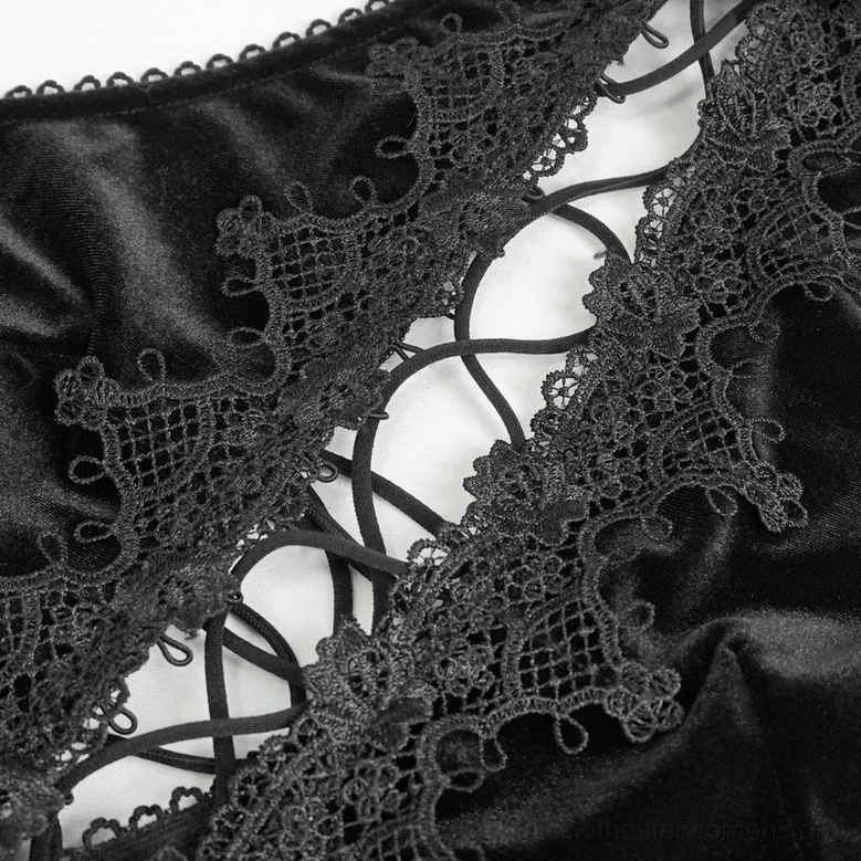 Gothic velvet halterneck dress detail showing fuzzy collar and matching cuff construction