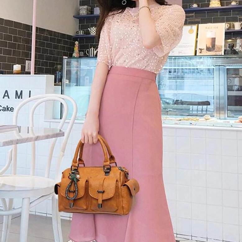 Adjustable strap versatility of gothic leather handbag - shoulder carry crossbody hand-held options