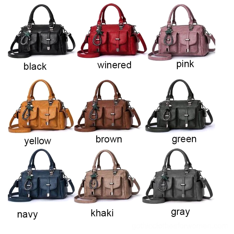 Polyester lining interior of gothic leather handbag showing cell phone pocket and compartments