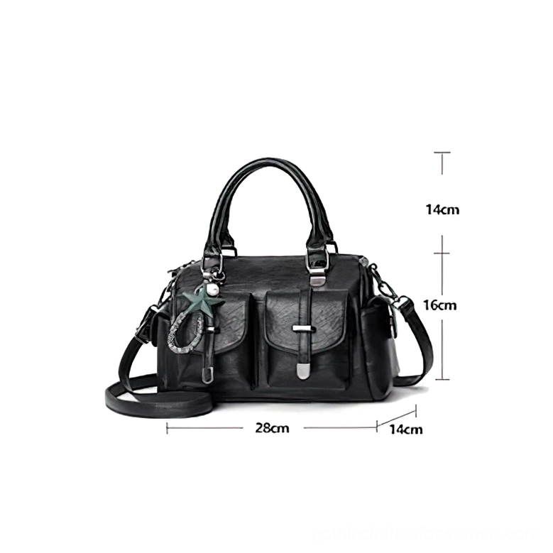 Gothic star pendant leather handbag interior detail showing zipper pocket and phone compartment organization