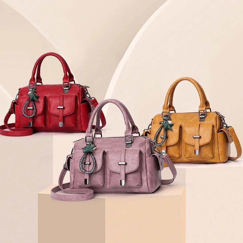 Gothic handbag zipper closure detail and hardware - secure fastening on PU leather boston tote