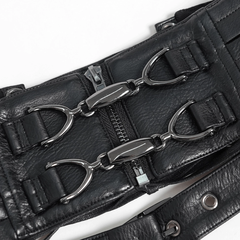 Close-up detail of black gothic harness hardware showing metal buckles and zipper pocket mechanisms