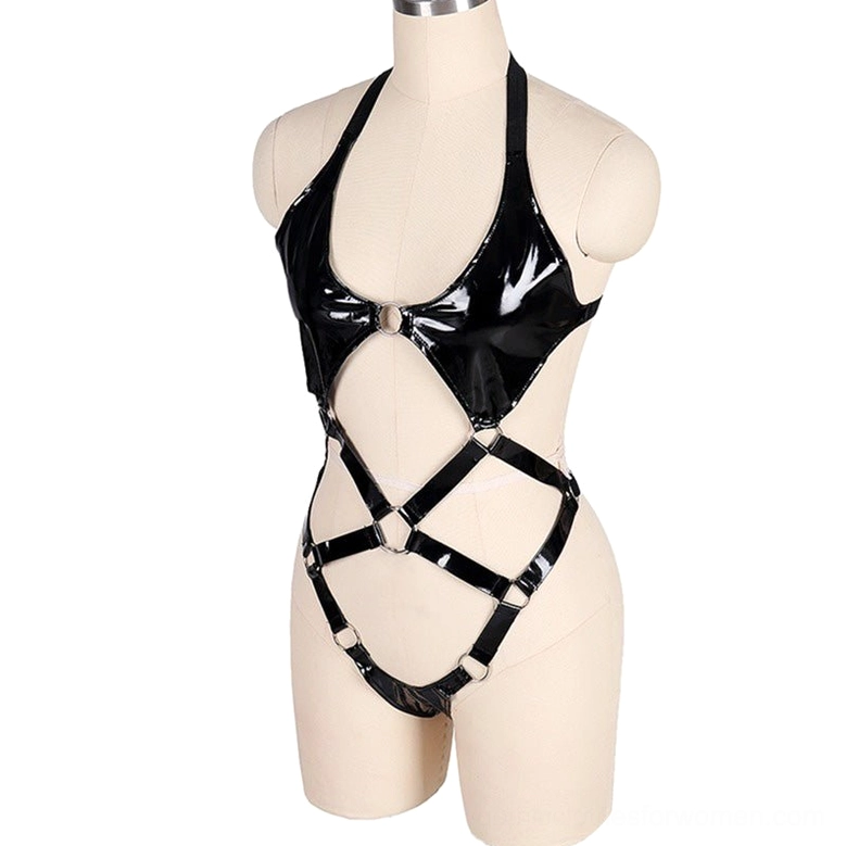 Patent leather gothic harness bodysuit on mannequin front view with glossy black PU finish and chest metal ring accents