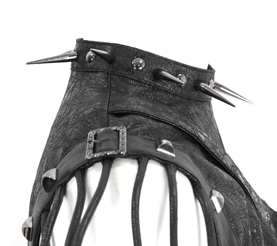 Close-up detail of gothic harness collar and neckline with spike studs and buckle fasteners