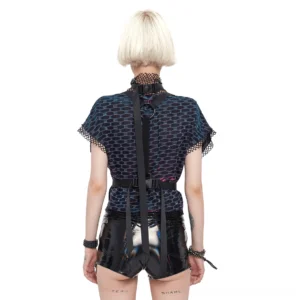 Back view of grunge mesh crop top with O-ring harness detail and adjustable trailing straps