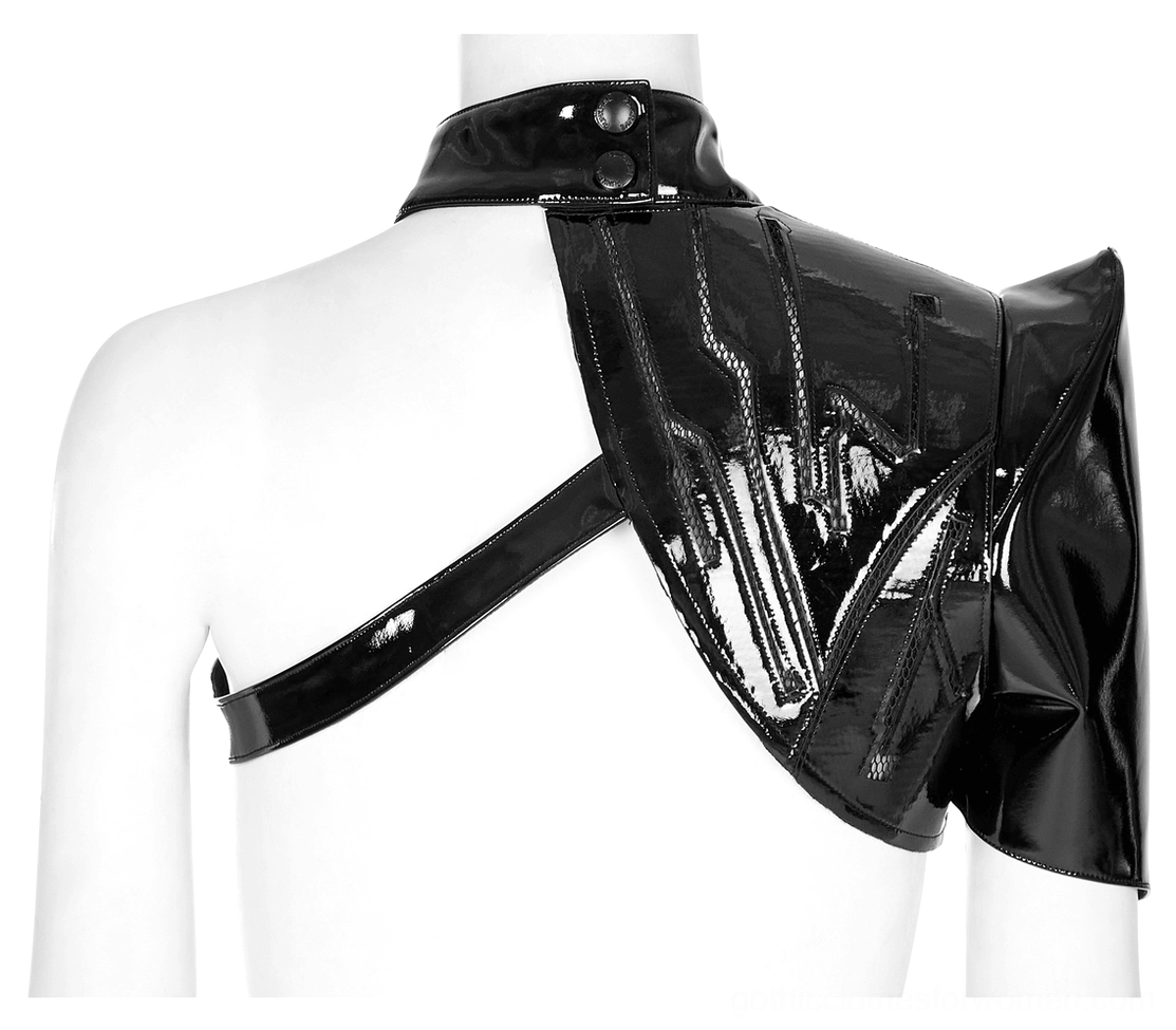 Rear view of gothic patent leather shoulder harness showing adjustable crossbody strap and dual snap fasteners on mannequin