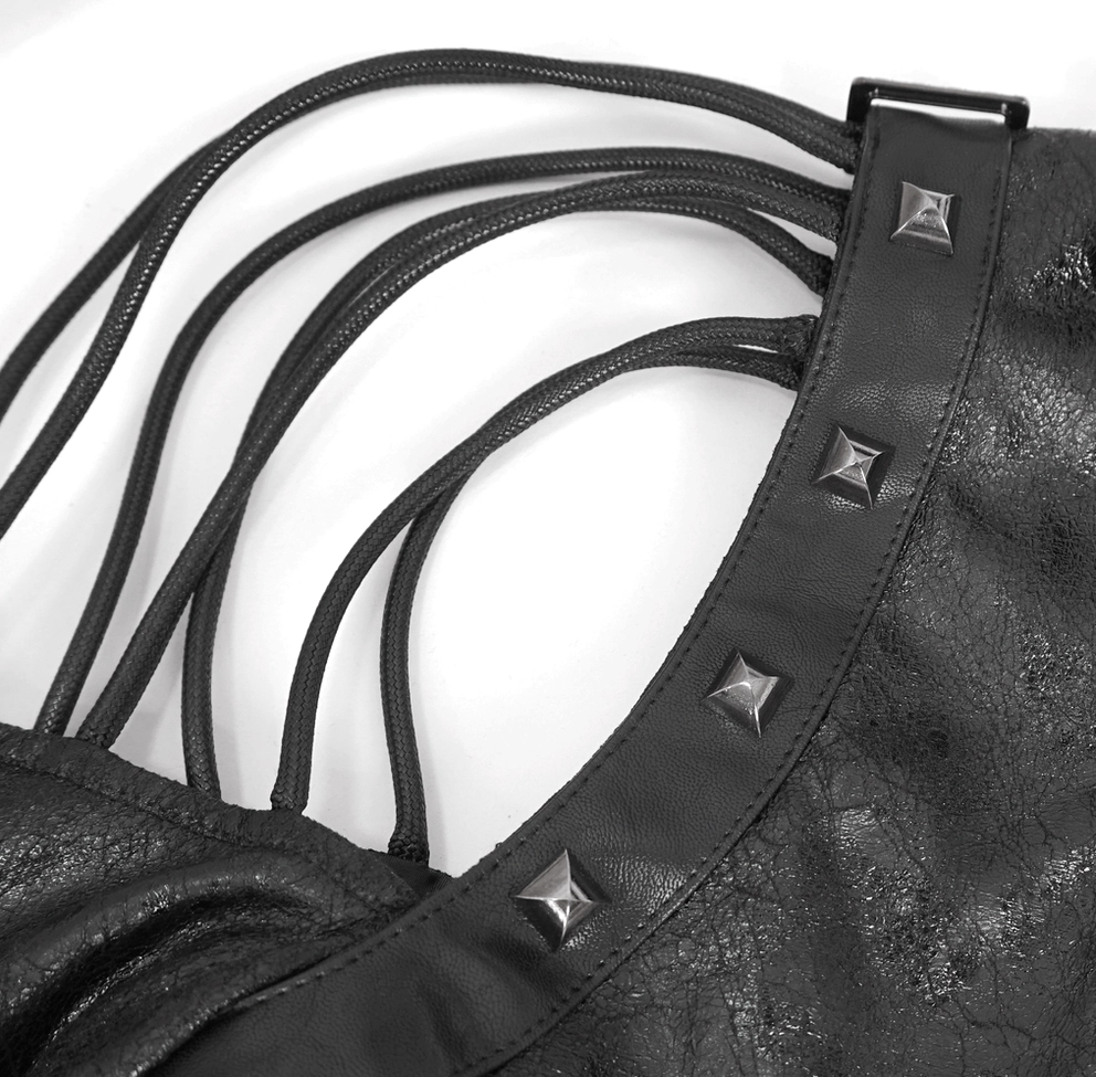 Side close-up view of gothic harness shoulder strap with square pyramid studs and slitted design
