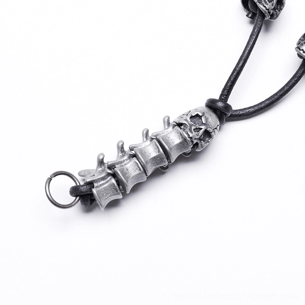 Silver skull and spine metal charm details on gothic chain harness, aluminum alloy decorative elements