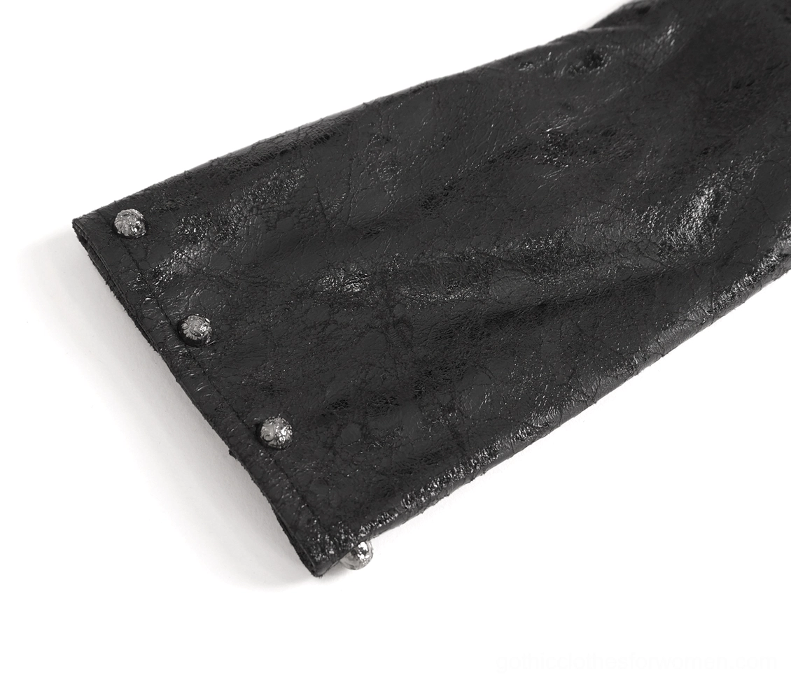 Gothic one-shoulder harness styling view with buckled straps and dark aesthetic elements