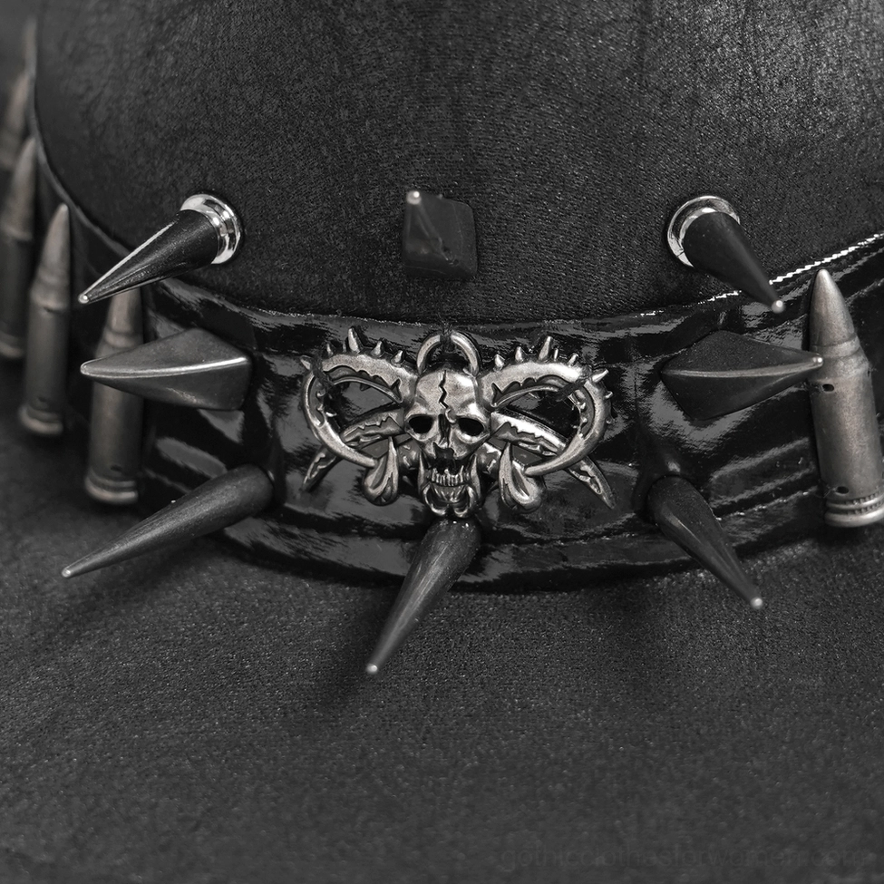 Gothic spiked cowboy hat close-up showing metal spike bullet and skull emblem craftsmanship