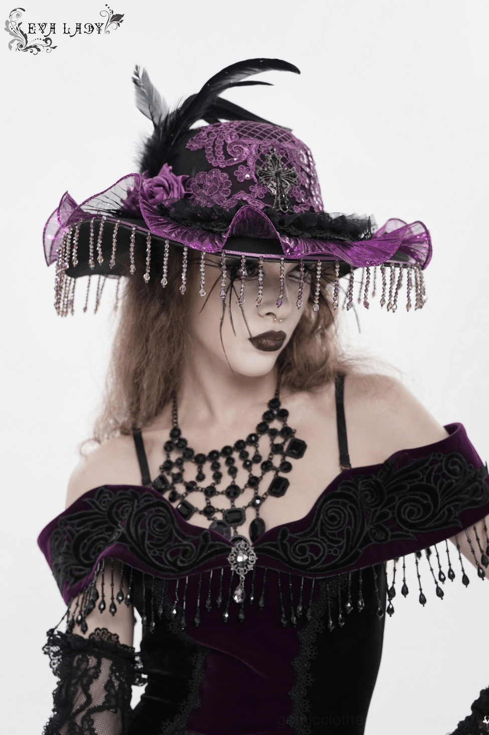Gothic wide brim hat texture detail showing feather and lace quality