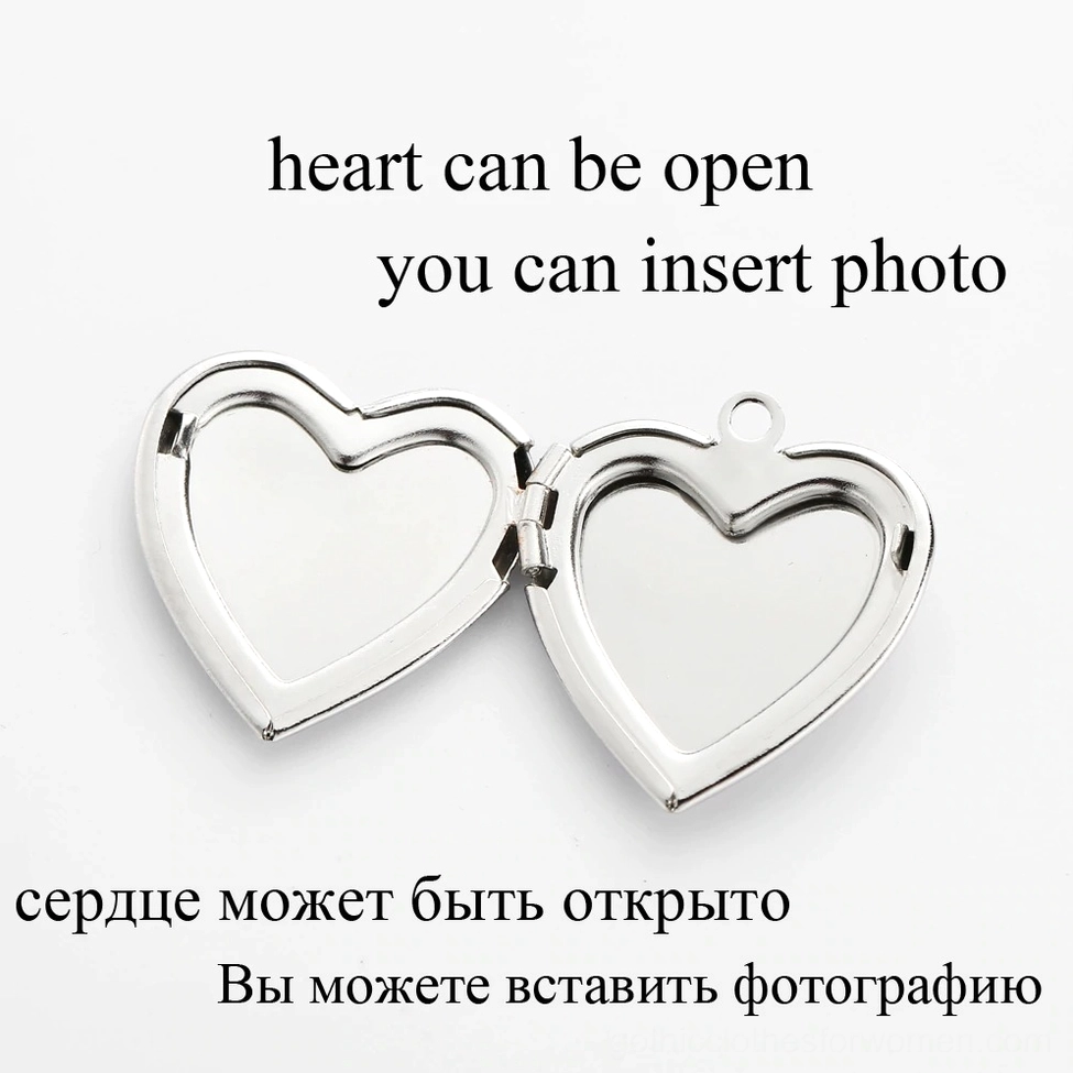 Openable heart locket pendant with removable photo insert, gothic jewelry functional feature on white background, usage instructions included