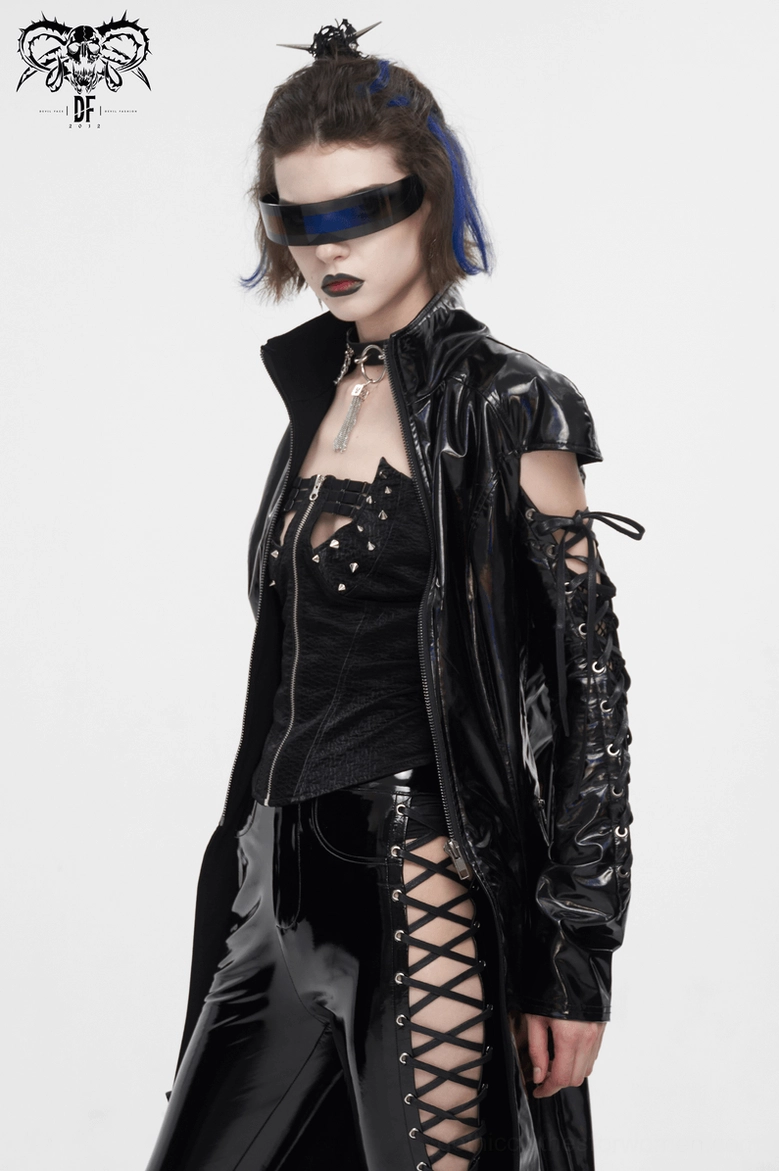 Alternative fashion model wearing holographic gothic coat with lace-up cold shoulders, full body side angle shot