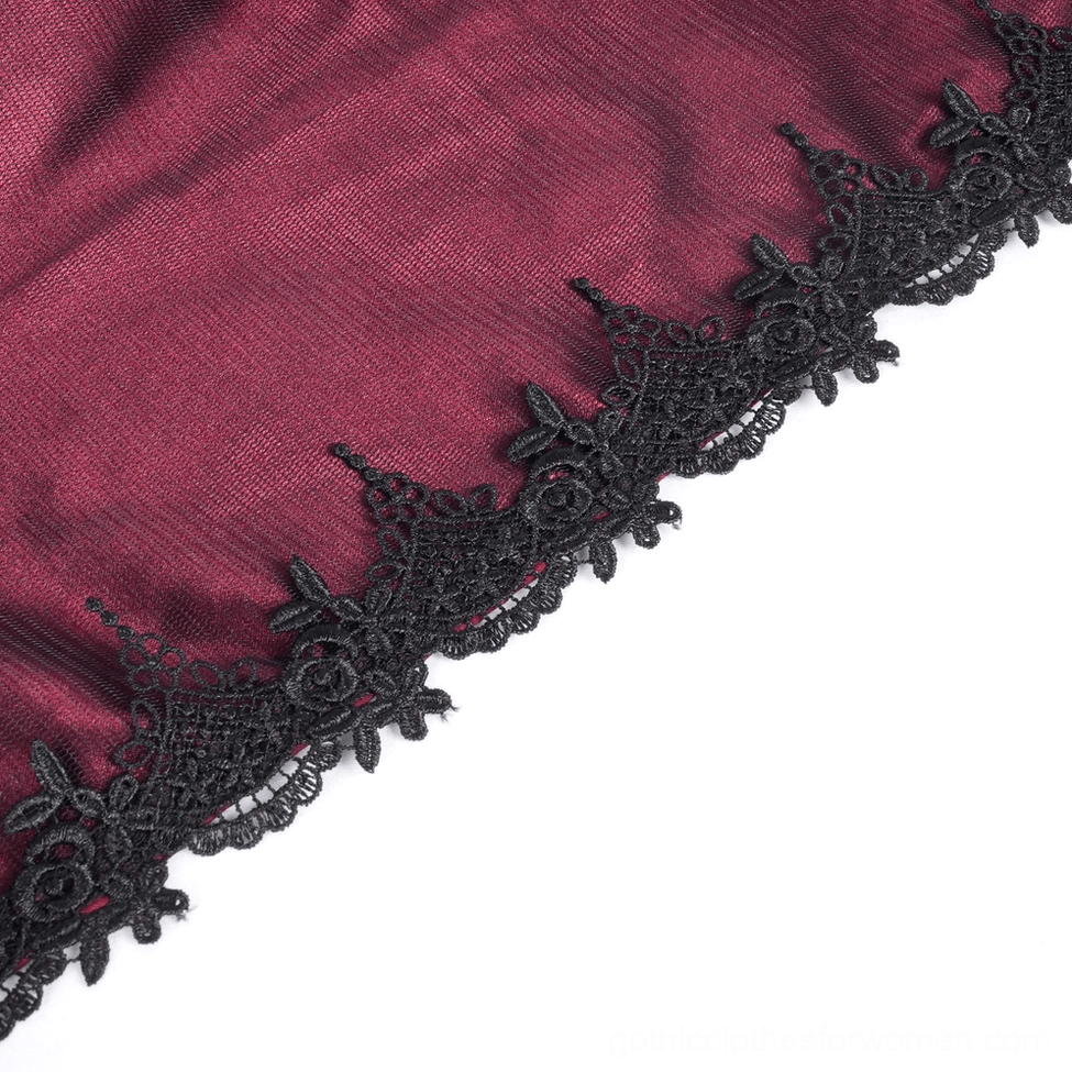 Detailed view of gothic hooded cape lace embroidery and ornamentation showcasing the intricate craftsmanship of trim work