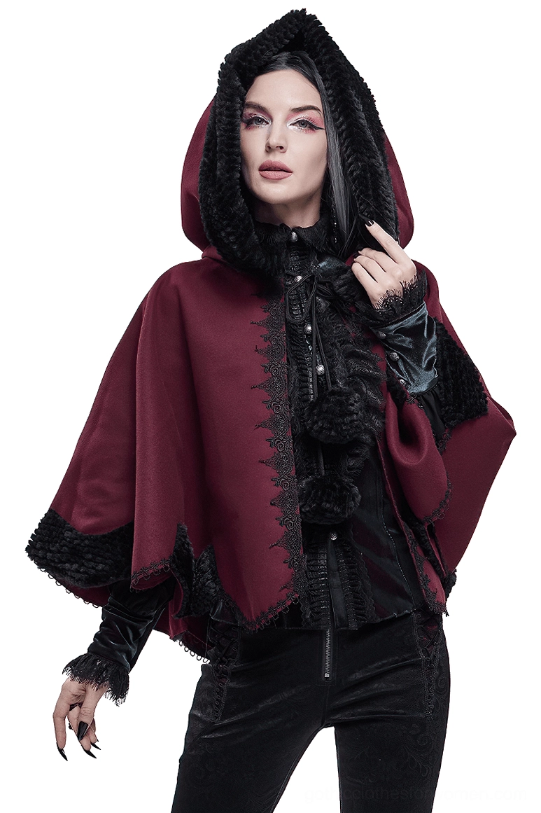 Red gothic hooded cape front three-quarter view on female model with black fur trim and pom-pom closures