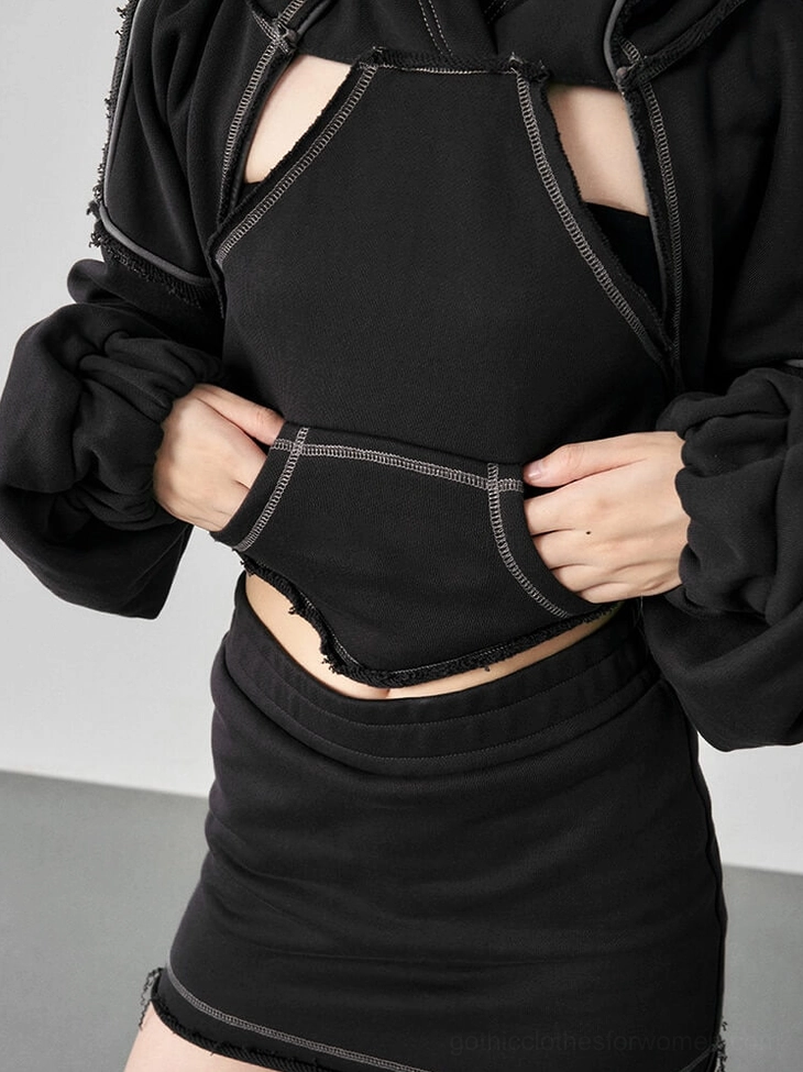 Gothic hoodie tie-back closure detail showing backless design and bow-tie construction on mannequin