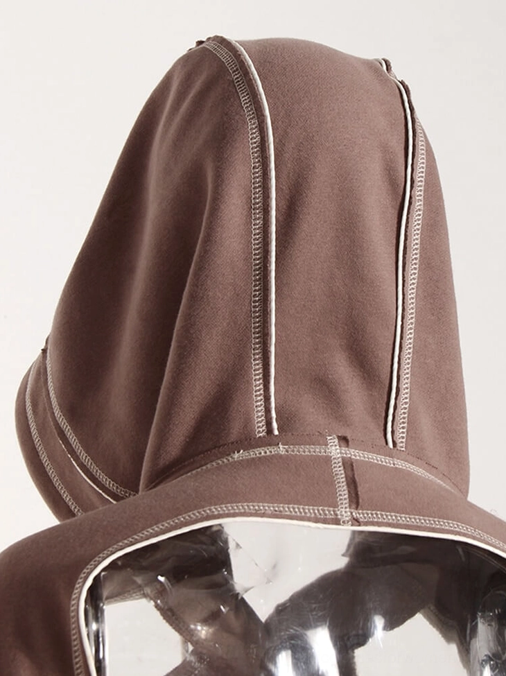 Gothic hoodie hood and drawstring detail close-up showing craftsmanship and contrast stitching