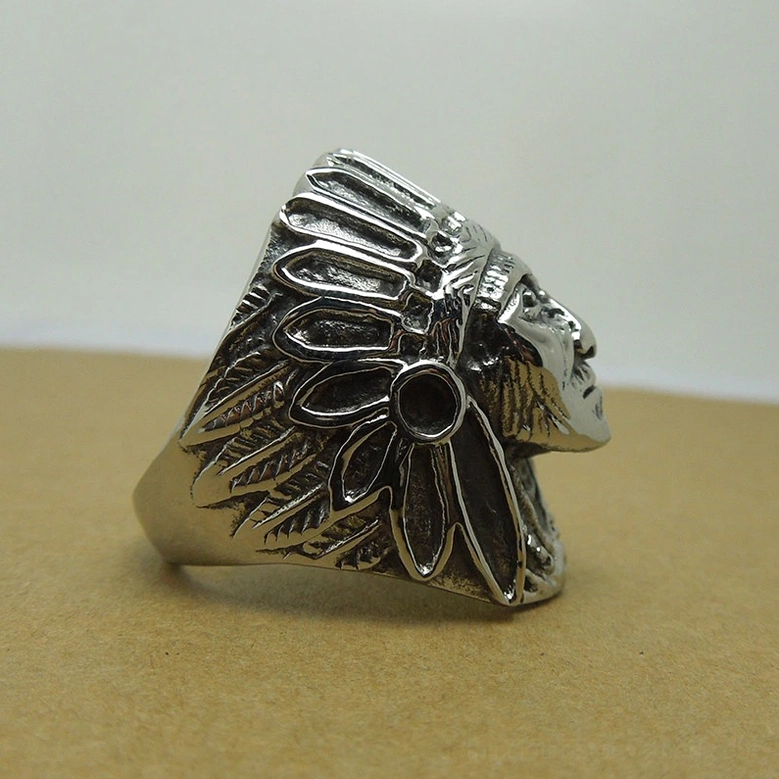 Gothic Indian chief ring from front angle showing three-dimensional carved relief work and substantial statement presence