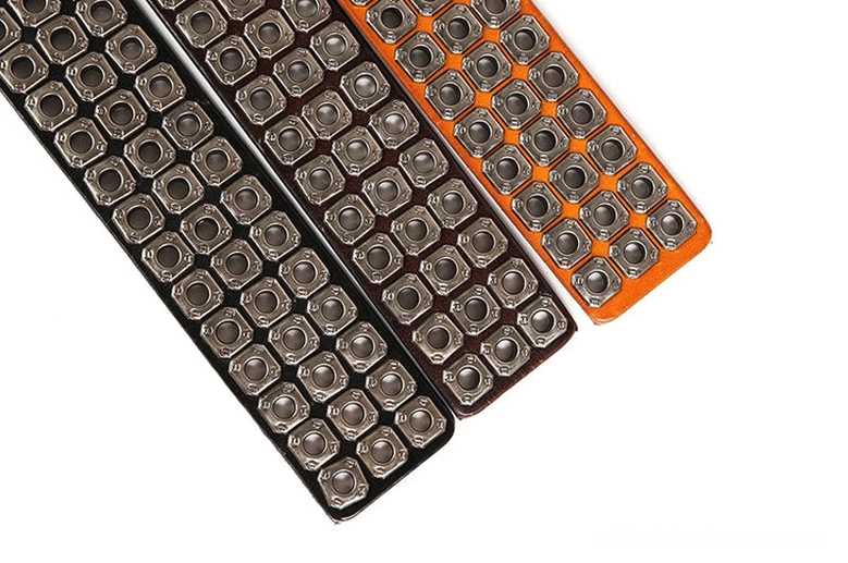 Gothic studded leather belt featuring industrial metal rivets and dark leather construction for alternative fashion