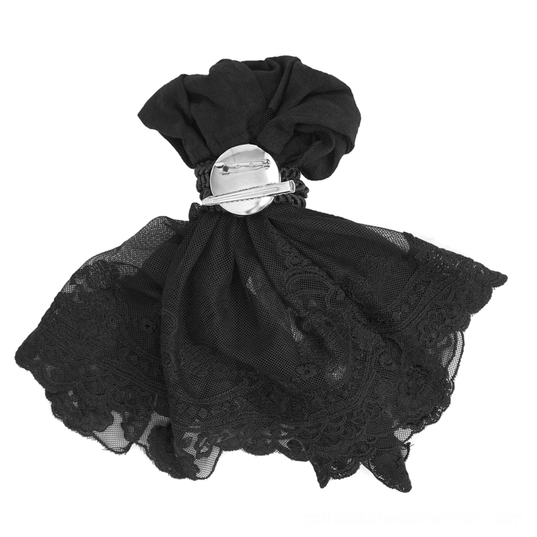 Back side flat lay view of gothic jabot tie showing mesh lace, fabric ruffle construction, and back brooch clasp mechanism