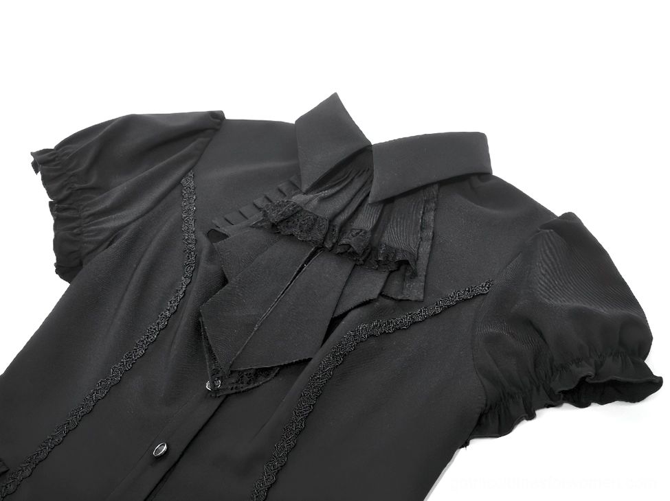 Gothic blouse jabot collar close-up showing ruffled lace trim and button placket details