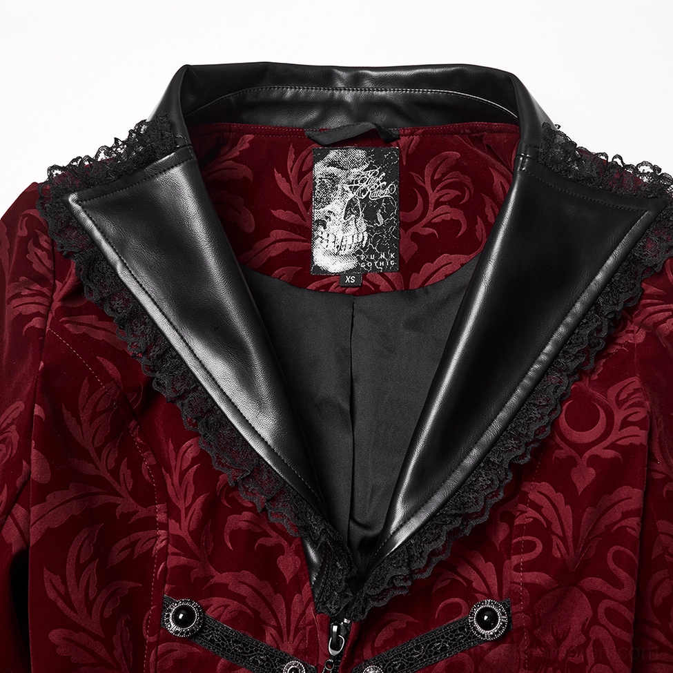 Close-up of gothic jacket collar showing leather lapel with lace edge and branded skull lining