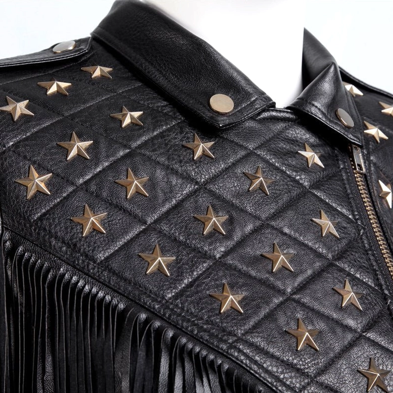 Close-up detail of gothic biker jacket collar panel showing quilted stitching with bronze star studs and snap button